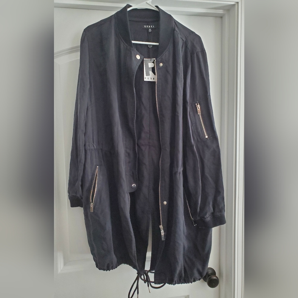 Women's black lightweight jacket.